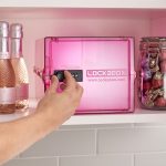 Pink food safe on kitchen shelf being opened